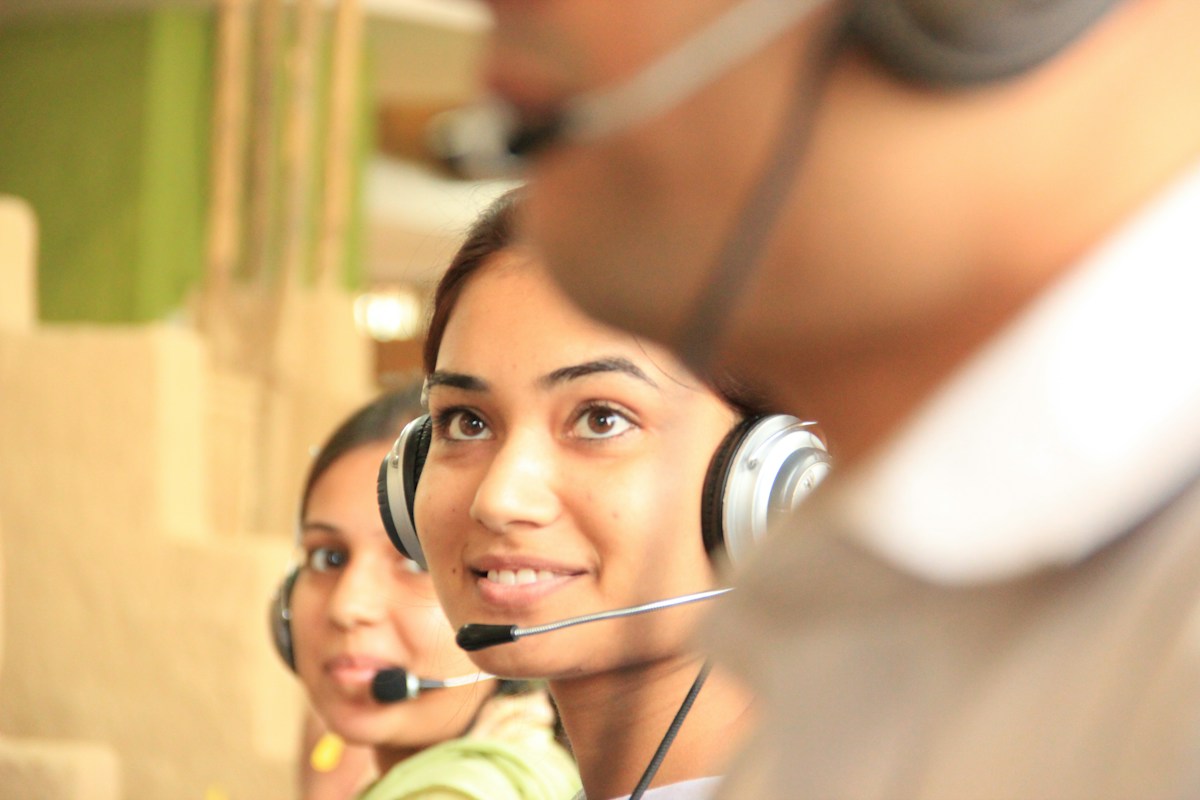 Support agent wearing a headset